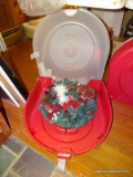 (FM) WREATH; HOLIDAY WREATH IN PROTECTIVE CASE. HAS PINE CONE AND POINSETTIA ACCENTS