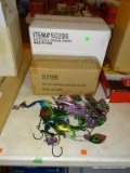 (LR) YARD DECORATIONS; NEW IN BOX BUTTERFLY SPHERE AND A SOLAR LIGHTED PEACOCK STAKE AND INCLUDES A