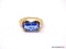 18KT YELLOW GOLD OVER .925 STERLING SILVER RING WITH LARGE MARQUISE CUT SYNTHETIC BLUE SAPPHIRE.