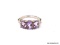 .925 STERLING SILVER RING WITH (3) OVAL SYNTHETIC AMETHYST STONES. COMES WITH BOX. RING SIZE IS