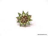 .925 STERLING SILVER SUNFLOWER RING WITH GREEN PEAR SHAPED STONES ON THE OUTSIDE & ORANGE ROUND