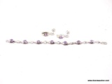 .925 STERLING SILVER & SYNTHETIC AMETHYST BRACELET WITH MATCHING PAIR OF EARRINGS. BOTH COME IN A