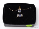 GOLD OVER STERLING SILVER NECKLACE & RING SET. BOTH PIECES HAVE LARGE CUSHION CUT BLUE STONES