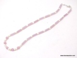 .925 STERLING SILVER & PINK/WHITE STONE NECKLACE. COMES WITH BAG AND BOX. MEASURES 19