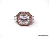 REAL COLLECTION BY ADRIENNE, STUNNING .925 STERLING SILVER RING WITH LARGE SQUARE CUT CZ IN THE