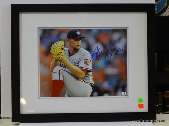 SIGNED WASHINGTON NATIONALS PHOTOGRAPH; IS OF AND SIGNED BY STEPHEN STRASBURG. HAS 2 COAS (1 FROM