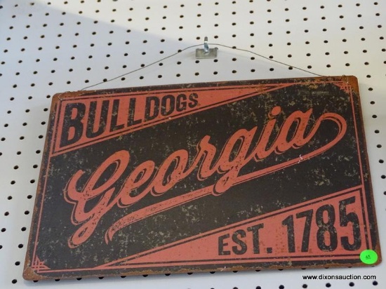 GEORGIA BULLDOGS ADVERTISING SIGN; IS RED AND BLACK IN COLOR. MEASURES 16 IN X 13 IN
