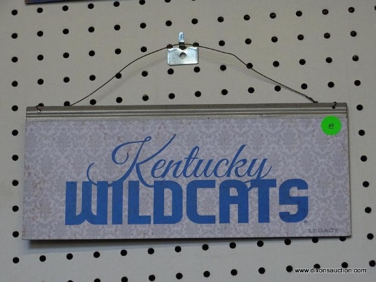 KENTUCKY WILDCATS ADVERTISING SIGN; IS BLUE AND GRAY IN COLOR. MEASURES 12 IN X 5.5 IN