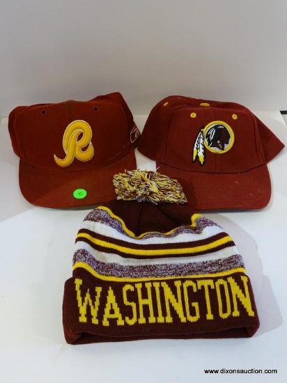 REDSKINS LOT; INCLUDES 2 REDSKINS BALL CAPS AND A REDSKINS BEANIE.
