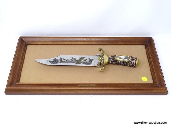 LIMITED EDITION "THE AMERICAN EAGLE" BOWIE KNIFE BY RONALD VAN RUYKEVELT. MOUNTED WITH WOODEN FRAME.
