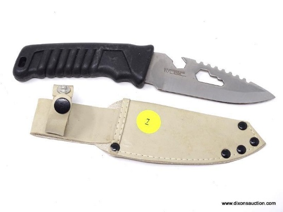 WYL STAINLESS STEEL FIXED BLADE KNIFE WITH GUT HOOK AND BLACK PLASTIC HANDLE. COMES IN CREAM COLORED