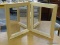 BI-FOLD MIRROR; MAPLE FRAMED BI-FOLD MIRROR IN EXCELLENT CONDITION. EACH HALF MEASURES 16 IN X 19