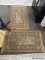 AREA RUGS; PAIR OF VINTAGE FLORAL PATTERN AREA RUGS IN HUES OF RED, BLACK, AND CREAM. EACH MEASURES