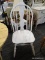 BOW BACK SIDE CHAIR; HAS A FIDDLE AND SPINDLE BACK WITH A PLANK BOTTOM SEAT AND TURNED LEGS. IS IN A