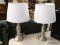 PAIR OF TABLE LAMPS; EACH HAS A WHITE FABRIC BELL SHAPED LAMPSHADE. EACH IS IN EXCELLENT CONDITION