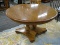 PEDESTAL TABLE; ROUND TOP TABLE WITH A PEDESTAL BASE THAT SITS ON BUN FEET. IS IN EXCELLENT