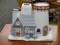 PARTYLITE VOTIVE HOLDER; IN THE FORM OF A LIGHTHOUSE WITH A VOTIVE HOLDER ON TOP OF THE LIGHT HOUSE