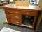 DRESSER; HAS 4 DRAWERS WITH PEWTER HANDLES, A MINI FRIDGE STORAGE AREA THAT MEASURES 18 IN X 21 IN,