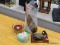 ASSORTED LOT; INCLUDES AN ART GLASS VASE, A CANADIAN GOOSE FIGURINE, A SEASHELL THEMED TRINKET BOX,