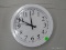WALL CLOCK; WHITE ROUND WALL CLOCK IN GOOD CONDITION. JUST NEEDS A NEW BATTERY.