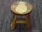 STOOL; PINEAPPLE THEMED PINE STOOL IN EXCELLENT CONDITION. MEASURES 10 IN X 10 IN