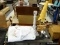 ASSORTED LOT; INCLUDES A WOODEN SPINDLE, AN AIRPLANE THEMED LAMP, TABLE CLOTHS, A FLOOD LIGHT, ETC.