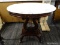 VICTORIAN MARBLE TOP TABLE; HAS A WHITE MARBLE TOP AND MAHOGANY BONES WITH A LYRE STYLE BODY AND