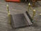 LOG HOLDER; BRASS AND IRON LOG HOLDER IN VERY GOOD CONDITION. MEASURES 20 IN X 17 IN X 14 IN
