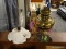 2 LAMP LOT; INCLUDES A BRASS OIL LAMP CONVERTED TO ELECTRIC AND A PORCELAIN LAMP BASE WITH A TUBE