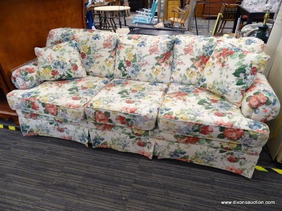 FLORAL UPHOLSTERED SOFA; INCLUDES 2 MATCHING UPHOLSTERED PILLOWS AND IS IN GOOD USED CONDITION.