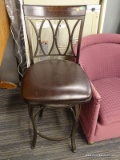 BARSTOOL; MAHOGANY AND METAL SWIVEL BARSTOOL WITH AN ARTIFICIAL LEATHER UPHOLSTERED SEAT. MEASURES