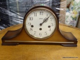 MANTLE CLOCK; MAHOGANY FINISH LINDEN MANTLE CLOCK IN GOOD CONDITION. HAS BRASS INNER WORKINGS AND