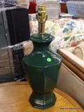 TABLE LAMP; GREEN URN SHAPED LAMP IN GOOD CONDITION. NEEDS A SHADE AND BULB. MEASURES 22 IN TALL