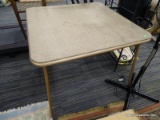CARD TABLE; METAL AND HARD PLASTIC TOP FOLDING CARD TABLE IN GOOD CONDITION. MEASURES 35 IN X 35 IN