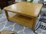 SQUARE COFFEE TABLE; BROYHILL OAK COFFEE TABLE WITH 1 LOWER SHELF. IS IN EXCELLENT CONDITION AND