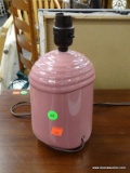 LAMP; PINK BODY LAMP WITH A WAVY DESIGN AT THE TOP. IS IN GOOD USED CONDITION. JUST NEEDS A SHADE