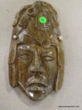POLISHED STONE MASK; CARVED AND POLISHED STONE MASK WITH ROPE FOR HANGING ON THE WALL. IS IN