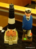 2 PIECE LOT; INCLUDES A WOODEN CARVED SEA CAPTAIN WITH A PEG LEG AND A LEFTON CHINA LIGHT HOUSE
