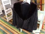 YOUNG GIRLS JACKET; HAS A FUR LINED COLLAR AND IS IN EXCELLENT CONDITION. BLACK IN COLOR.