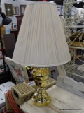 BRASS LAMP; BRASS TABLE LAMP WITH A HARP, SHADE, AND BRASS FINIAL. IS IN GOOD CONDITION AND MEASURES