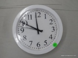 WALL CLOCK; WHITE ROUND WALL CLOCK IN GOOD CONDITION. JUST NEEDS A NEW BATTERY.