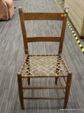 MAHOGANY SIDE CHAIR; HAS A WOVEN SEAT AND LADDER BACK WITH MULE EAR BACK FINIALS. IS IN GOOD USED