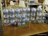 CHRISTMAS ORNAMENTS; TOTAL OF 9 CONTAINERS WITH SILVER TONED CHRISTMAS ORNAMENTS. 7 HAVE 3 TO A PACK