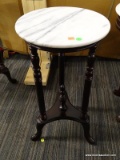 VICTORIAN MARBLE TOP PLANT STAND; HAS A WHITE MARBLE TOP AND MAHOGANY BONES WITH A LOWER CENTER