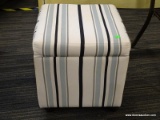 ROLLING STORAGE OTTOMAN; BLUE AND WHITE STRIPED OTTOMAN WITH A LIFT TOP THAT OPENS TO REVEAL