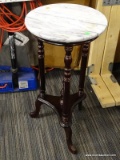 VICTORIAN MARBLE TOP PLANT STAND; HAS A WHITE MARBLE TOP AND MAHOGANY BONES WITH A LOWER CENTER