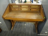 DESK; PINE DESK WITH UPPER DRAWER AREAS (MISSING DRAWERS EXCEPT 1). IS IN GOOD USED CONDITION AND