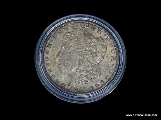 1897-P UNCIRCULATED TONED MORGAN SILVER DOLLAR.