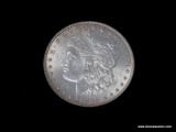 1882-P UNCIRCULATED MORGAN SILVER DOLLAR.