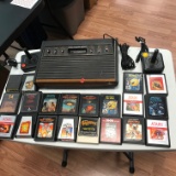 ATARI SYSTEM WITH MULTIPLE GAMES AND CONTROLLERS - UNTESTED